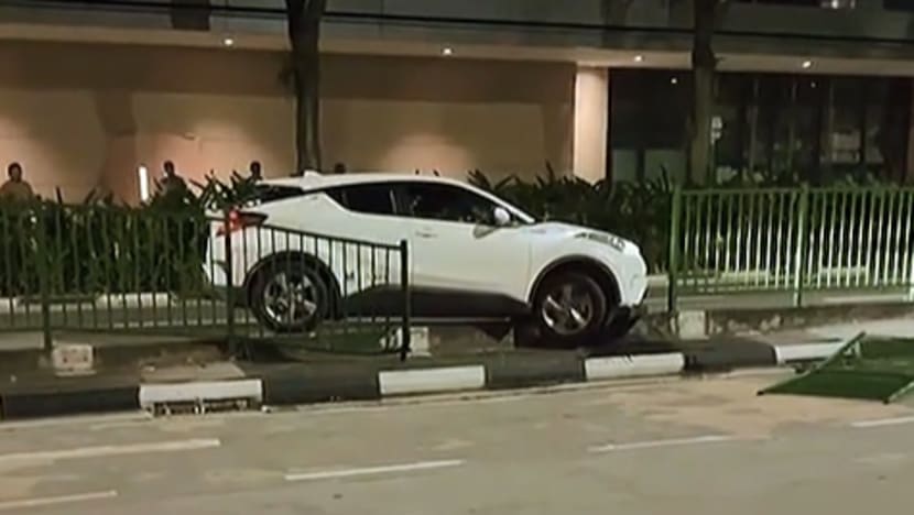 Man arrested after crashing into road divider, mounting kerb along Race Course Road