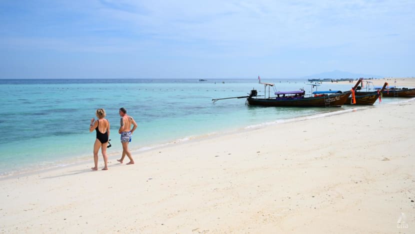 Thailand to ease entry rules for travellers, scrap outdoor mask mandate as it moves to endemic COVID-19