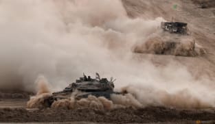 Israeli tanks kill 59 people in Gaza crowd trying to get food aid, medics say  