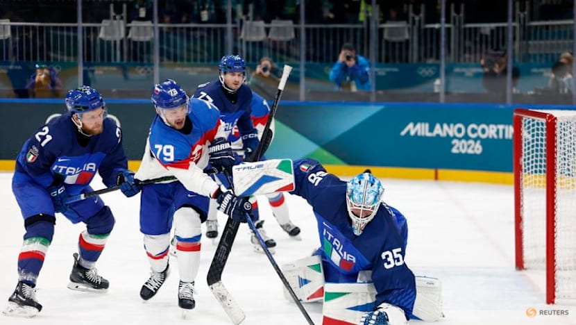 Ice hockey-Canada ease past Swiss, Finland beat Sweden, Slovakia, Czechs notch wins