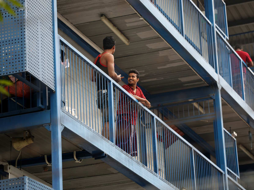 Residents of S11 Dormitory @ Punggol are seen chatting with each other. Preliminary links have been established between the clusters at Mustafa Centre, the construction site of Project Glory and five dormitories, including S11 Dormitory. Residents of S11 Dormitory @ Punggol are seen chatting with each other. Preliminary links have been established between the clusters at Mustafa Centre, the construction site of Project Glory and five dormitories, including S11 Dormitory.