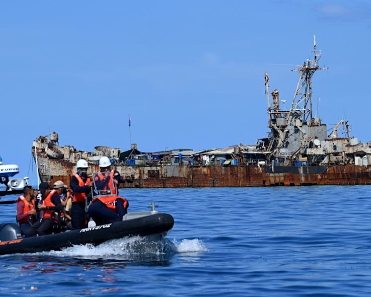 Philippine military says China injured sailor in sea clash