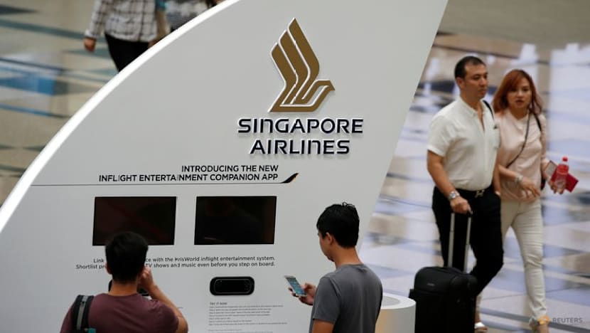 Singapore Airlines flags surging fuel costs; annual profit halves on one-offs
