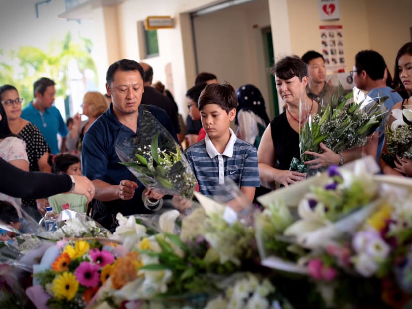 People offering their condolences at Tanjong Katong Primary School on June 7, 2015.. Photo: Jason Quah/TODAY People offering their condolences at Tanjong Katong Primary School on June 7, 2015.. Photo: Jason Quah/TODAY