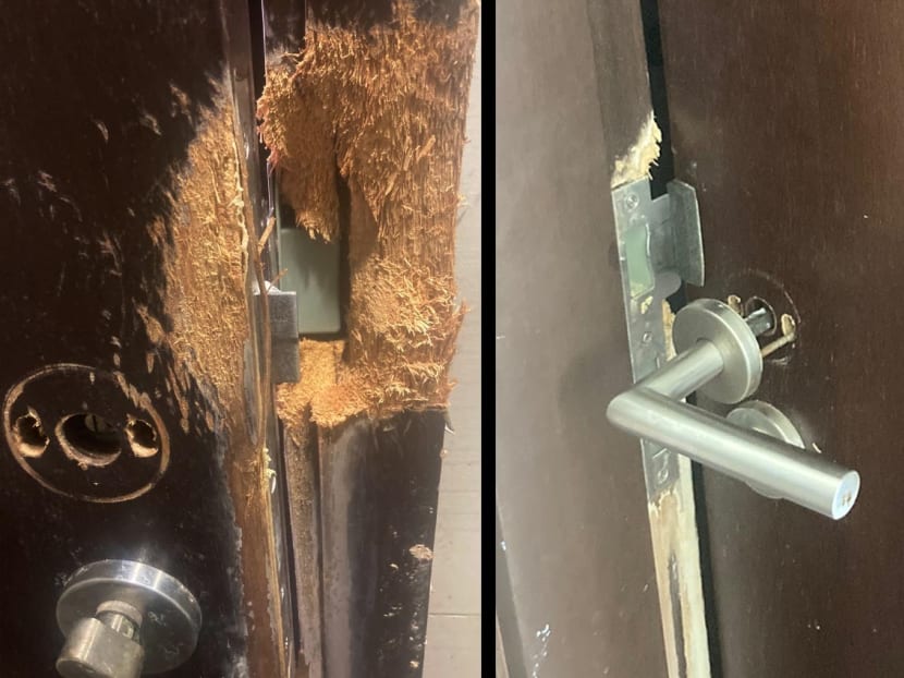 A woman tried to hack away at the bathroom door (pictured) after she was trapped for days in there while taking a shower. 