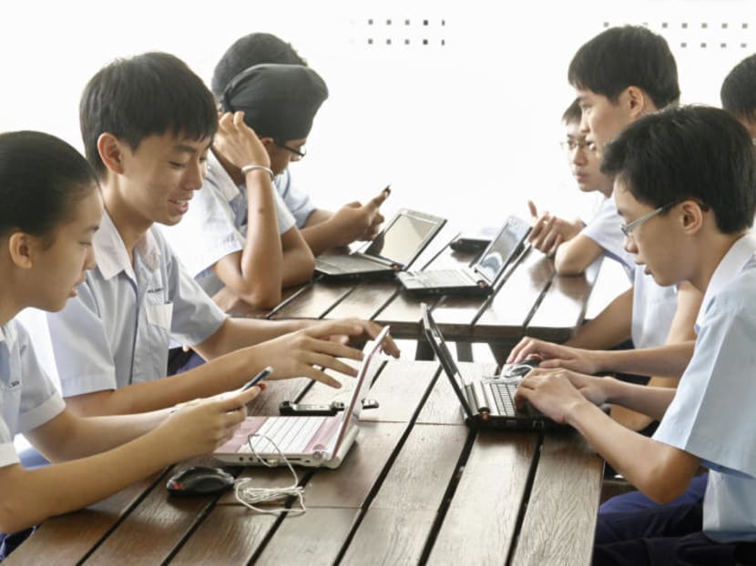 Students working on laptops in Ngee Ann Secondary School. Photo: Ernest Chua
