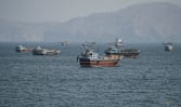 Two Singapore-registered vessels struck in Strait of Hormuz, one sinks