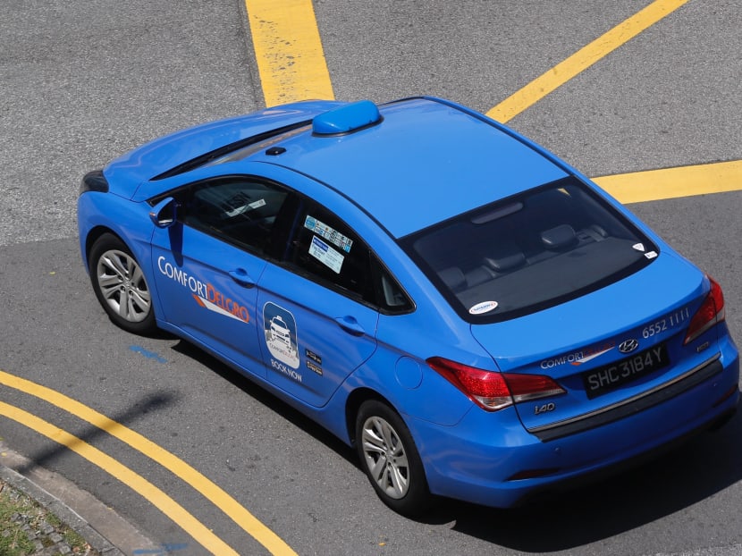 A ComfortDelGro taxi along New Bridge road. Photo: Najeer Yusof/ TODAY