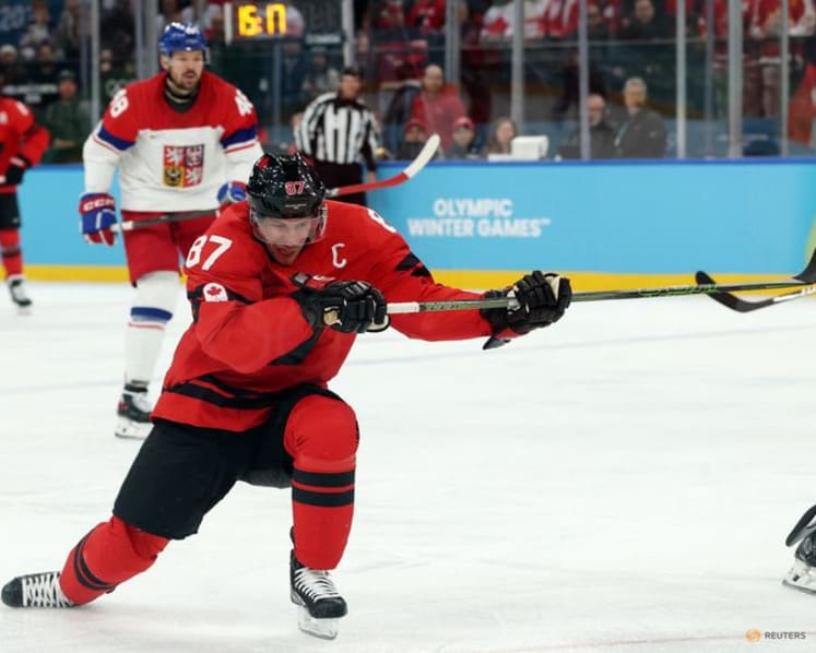 Ice hockey-'Go get it, boys': Injured Crosby's pep talk powers Canada quarter-final comeback