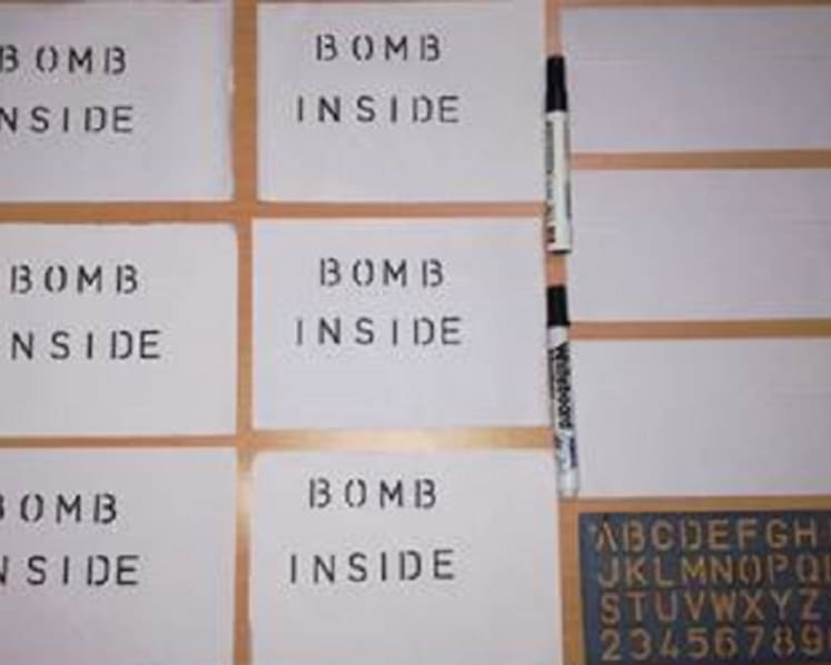 Man who sent fake bomb threats to Parliament House and police unit is jailed for 6 months