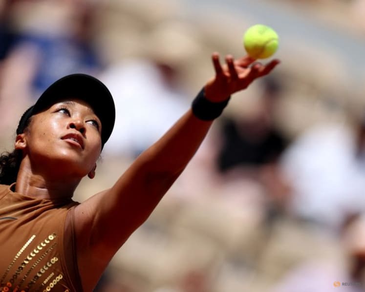 Gold-sequined Osaka survives three-set scare against teenager Jovic