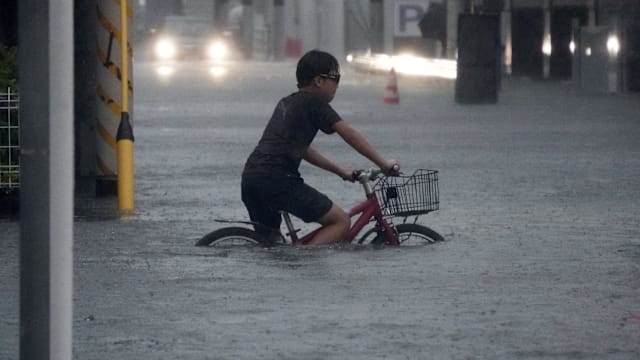 台风杜鹃重创日本关东  破纪录暴雨酿两人死亡