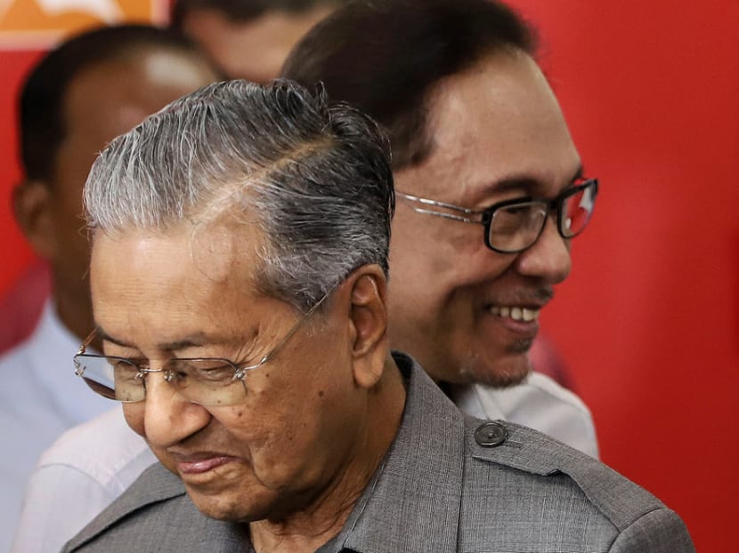 Tensions mount within the Pakatan Harapan coalition over the matter of when the handover of power from Dr Mahathir Mohamad (left) to Mr Anwar Ibrahim will take place.