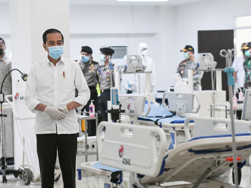 Indonesia's President Joko Widodo takes a look at the emergency hospital handling of Covid-19 in Kemayoran Athletes Village in Jakarta on March 23. Indonesia's President Joko Widodo takes a look at the emergency hospital handling of Covid-19 in Kemayoran Athletes Village in Jakarta on March 23.
