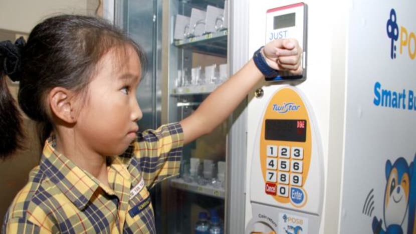 Kids dive into cashless payment, but some parents wonder if they should first learn to handle cash