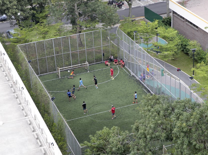 Residents playing at a futsal court in Yishun before the Covid-19 pandemic.