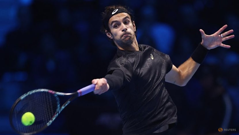 Alcaraz clinches year-end top spot with ATP Finals win over Musetti