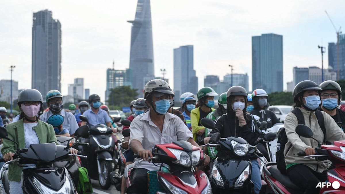 Vietnam waives green tax to cut petrol prices by a quarter