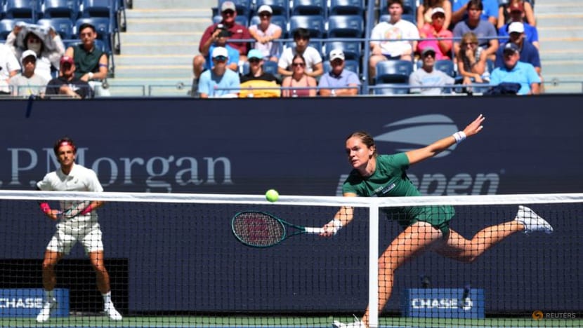 Defending champions trump singles stars in early US Open mixed doubles