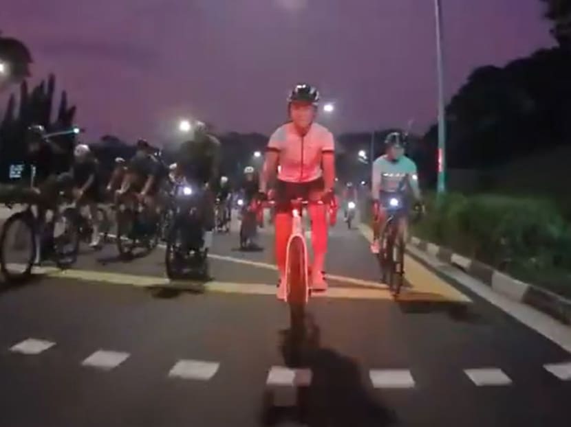 In a screengrab from the video posted by Ms Serlina Eng, another group of cyclists can be seen next to Ms Eng and her husband Mr Andy Oh's group along Upper Thomson Road on April 16, 2023.