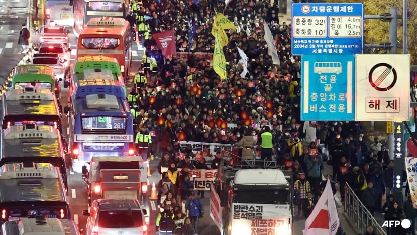 As it happened: Thousands march demanding South Korea's President Yoon resign over martial law move