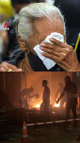 Grief, anger as friends, families mourn Bangkok pub fire victims