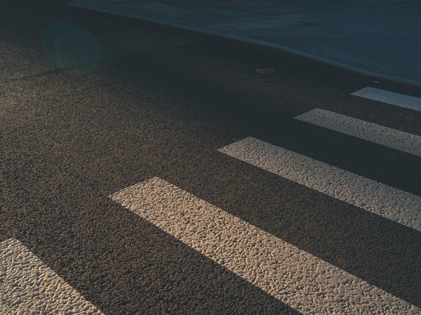 Van driver Mazlan Ujod failed to stop for a woman about to step onto a pedestrian crossing. When she confronted Mazlan later, he struck her with his van. Van driver Mazlan Ujod failed to stop for a woman about to step onto a pedestrian crossing. When she confronted Mazlan later, he struck her with his van.