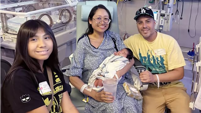 医学奇迹！足月男婴腹腔中发育 30医生协力接生