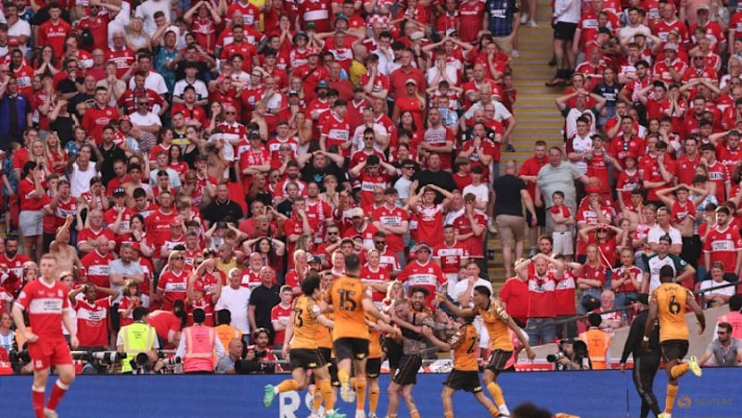Hull back in Premier League after McBurnie's last-gasp playoff winner
