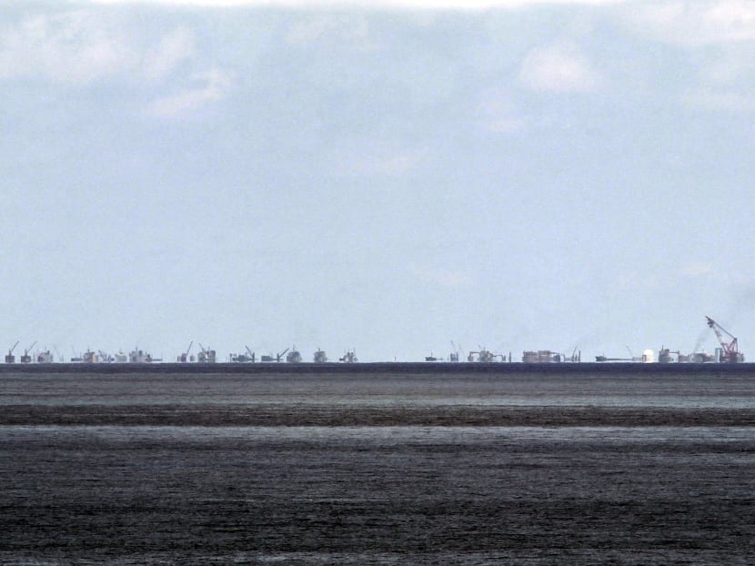 The alleged on-going land reclamation of China at Subi reef is seen from Pagasa island in the Spratlys group of islands in the South China Sea, west of Palawan, Philippines, in this May 11, 2015 file photo.  Photo: REUTERS