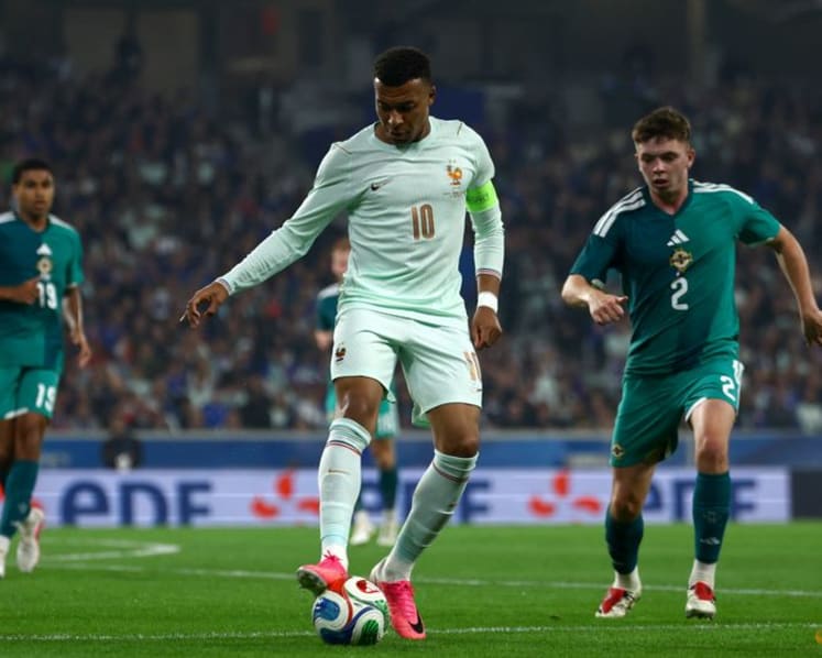 Olise stakes World Cup claim with hat-trick in France win