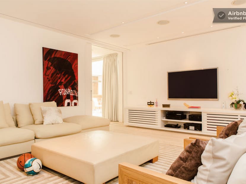 Just in case you don't know whose house you're staying in, these pictures and footballs help