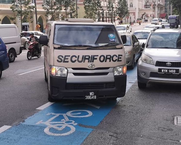 Honks, obstacles and fumes: Cycling in downtown KL can be a frustrating experience