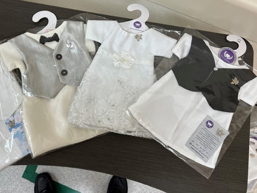 Gowns for babies to wear after their deaths. Ms Tan Fang Ling, the founder of the gowns' supplier Angel Hearts, said she believes that providing these gowns helps to support and bring closure for parents. Gowns for babies to wear after their deaths. Ms Tan Fang Ling, the founder of the gowns' supplier Angel Hearts, said she believes that providing these gowns helps to support and bring closure for parents.