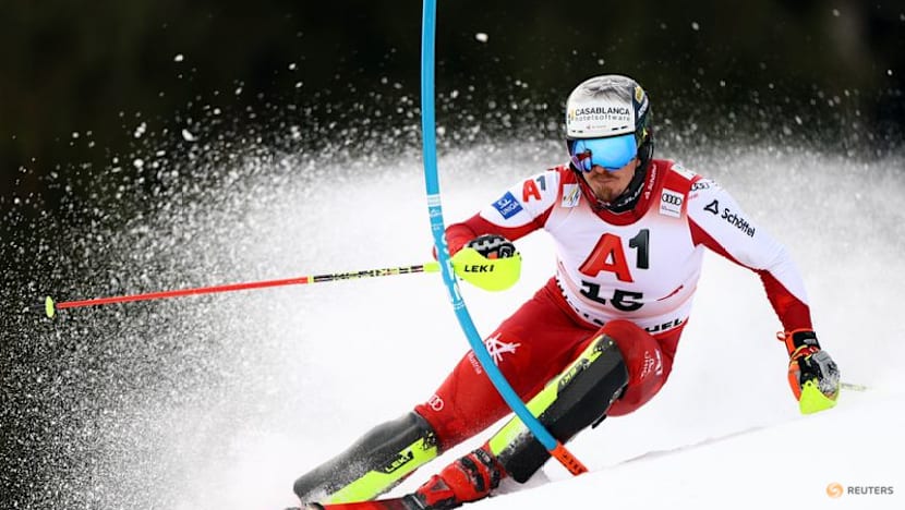 Alpine skiing-Feller a winner on home snow in Kitzbuehel slalom