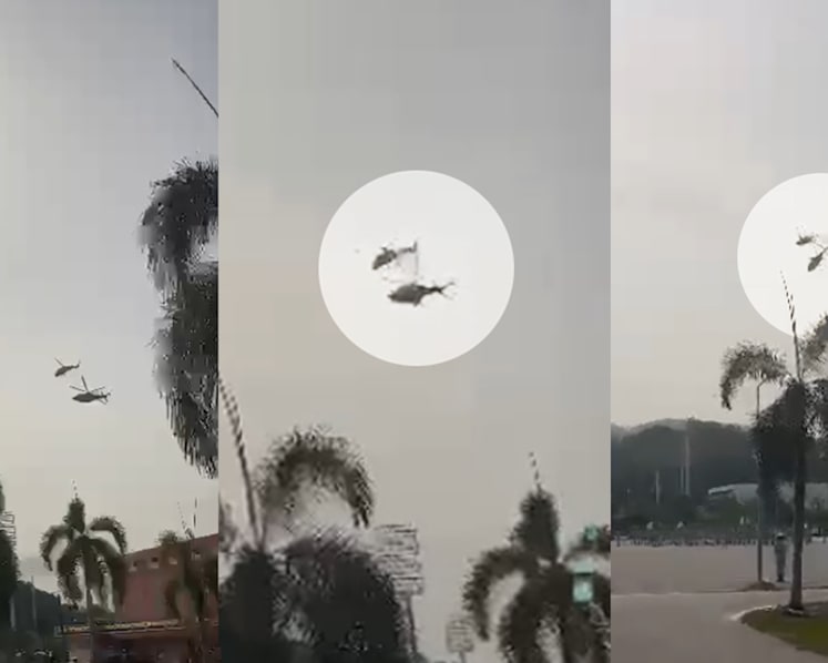 Ten killed after Malaysian military helicopters collide mid-air during navy parade rehearsal