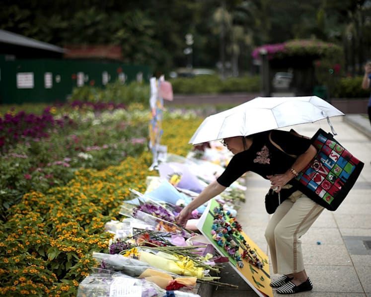 Quiet reflection as Singapore marks solemn anniversary