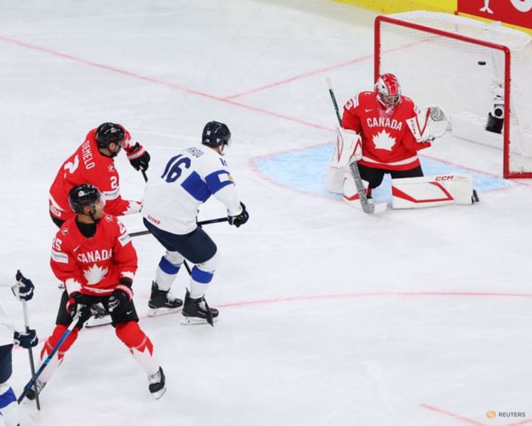 Ice Hockey-Feisty Finland beat Canada to make world championship final