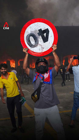 Nepal protesters set Kathmandu parliament building on fire