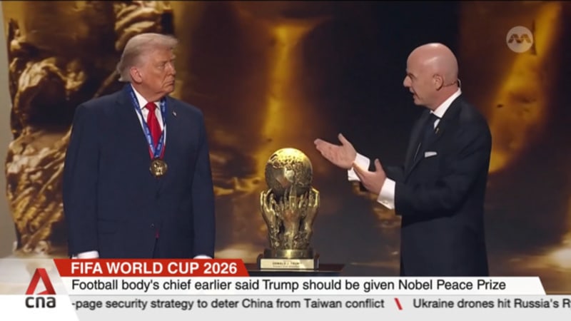World football body awards newly created peace prize to US President Donald Trump at WC draw