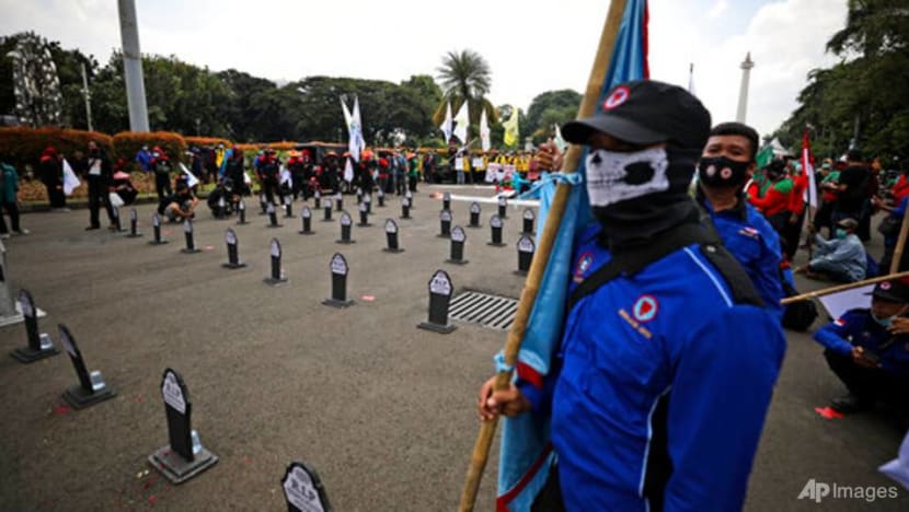 Workers protest Indonesia's labour law in May Day rallies Workers protest Indonesia's labour law in May Day rallies
