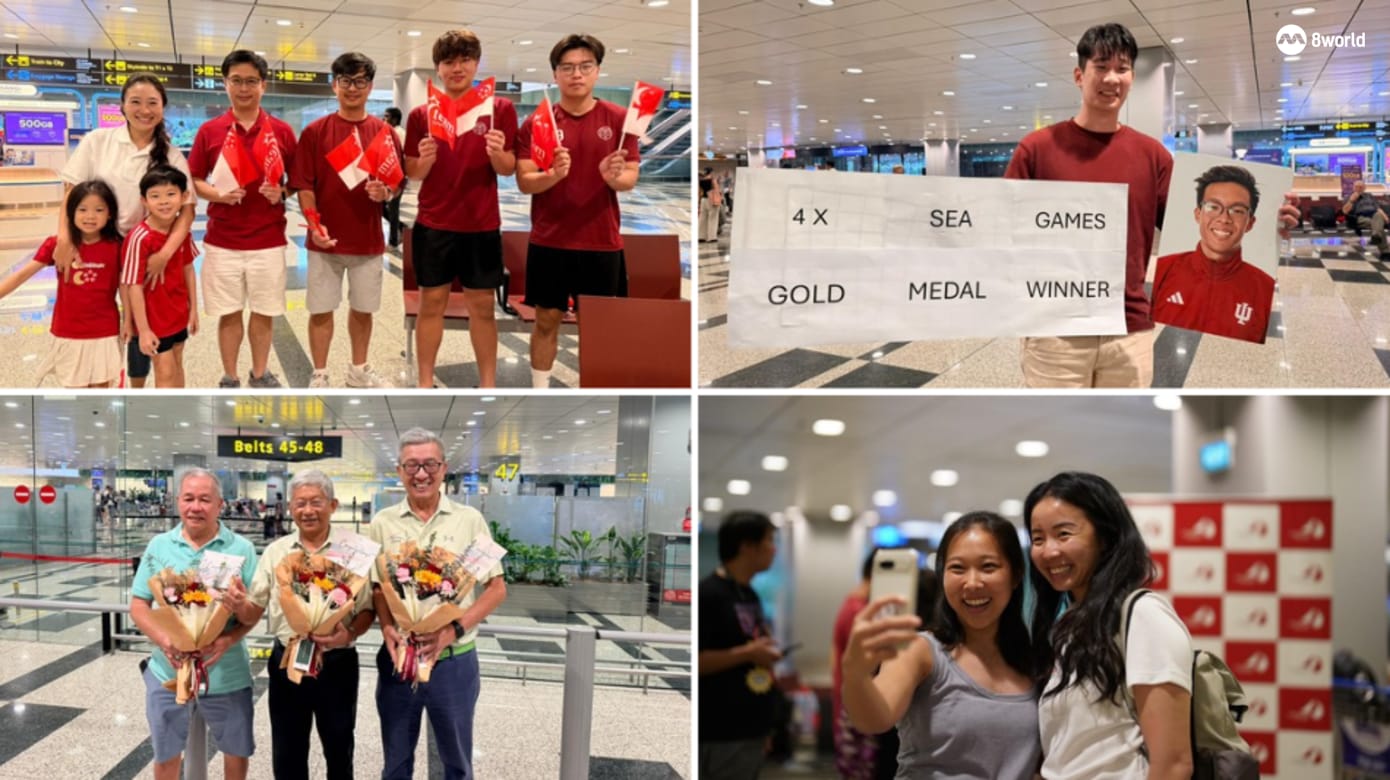 我国泳队和帆船队携40面奖牌凯旋 家属和支持者到机场迎接