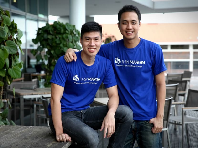 Alstone Tee (left), 29, and Tan Jin, 28, founders of online money changer, ThinMargin.com. Photo: Nuria Ling/TODAY Alstone Tee (left), 29, and Tan Jin, 28, founders of online money changer, ThinMargin.com. Photo: Nuria Ling/TODAY