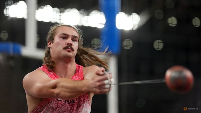 Katzberg retains world hammer title with monster throw