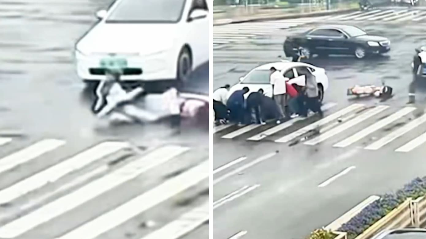 少女骑车闯黄灯遭卷车底 多名路人合力抬车救人