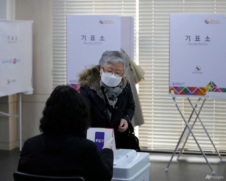 South Korea reports record 342,446 new COVID-19 cases as polls open