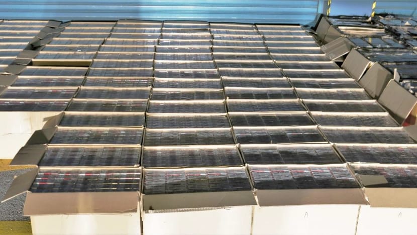 Syndicate leader gets jail and S$30m fine for smuggling cigarettes, bribing officer
