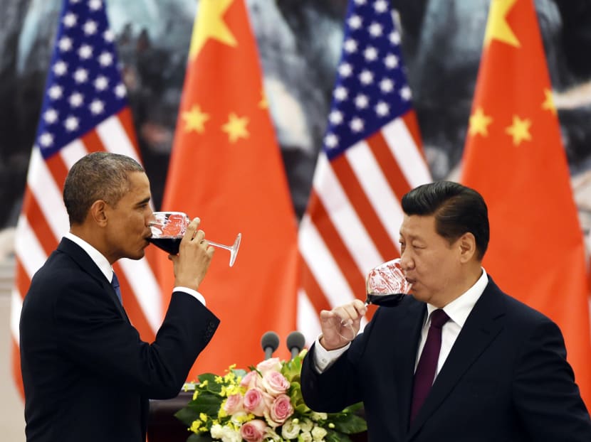 US President Barack Obama (L) and Chinese President Xi Jinping have a drink after a toast at a lunch banquet in the Great Hall of the People in Beijing November 12, 2014. Photo: Reuters US President Barack Obama (L) and Chinese President Xi Jinping have a drink after a toast at a lunch banquet in the Great Hall of the People in Beijing November 12, 2014. Photo: Reuters