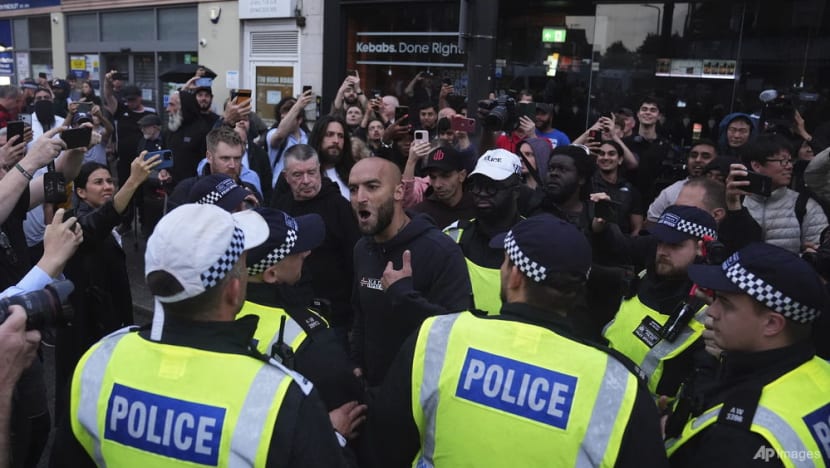 Britain takes steps to prevent racist riots resuming at weekend Britain takes steps to prevent racist riots resuming at weekend