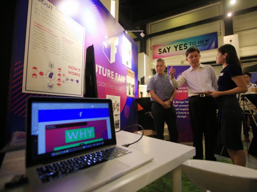 (2nd fom left) NTUC Secretary-General Chan Chun Sing and (left) NTUC Assistant Secretary-General Ang Hin Kee seen visiting the Future Fair Asia (aggregator) booth during the Labour Movement First "Fair for Freelancers" which brings Freelancers, Business Solution Providers and Service Aggregators Together. Photo: Koh Mui Fong/TODAY